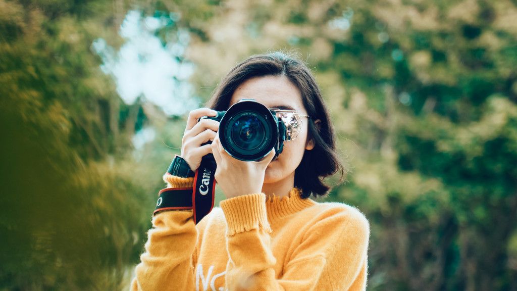 Photographer with a camera